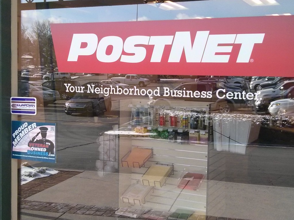 Veteran Owned Business Member Badge as seen on the storefront window of PostNet - Western Plaza (Knoxville, TN)