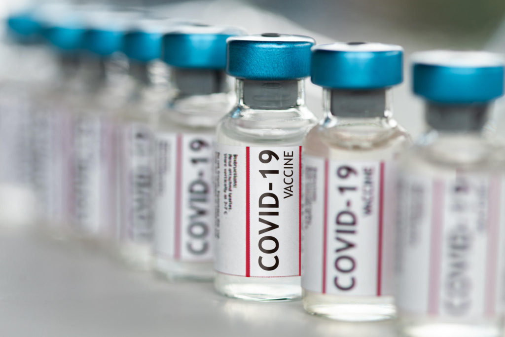 Covid-19 Coronavirus Vaccine vials in a row macro close up